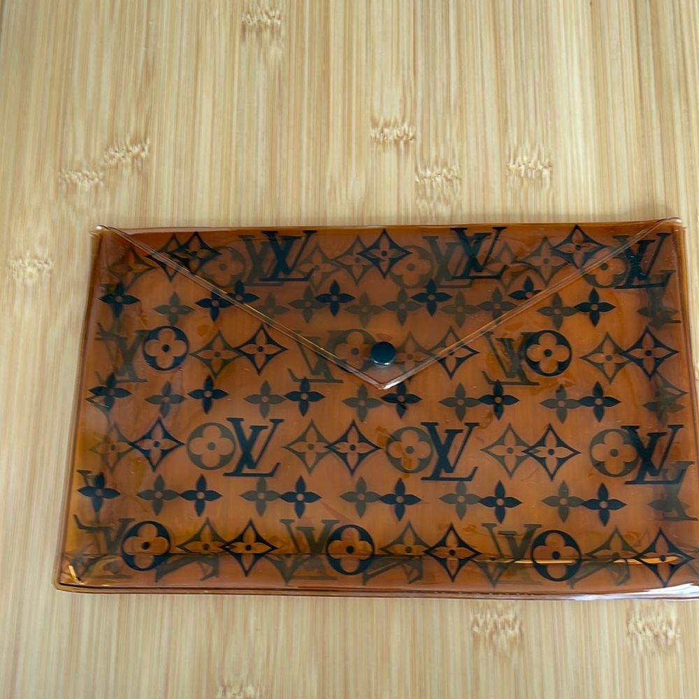 LV bathing suit case